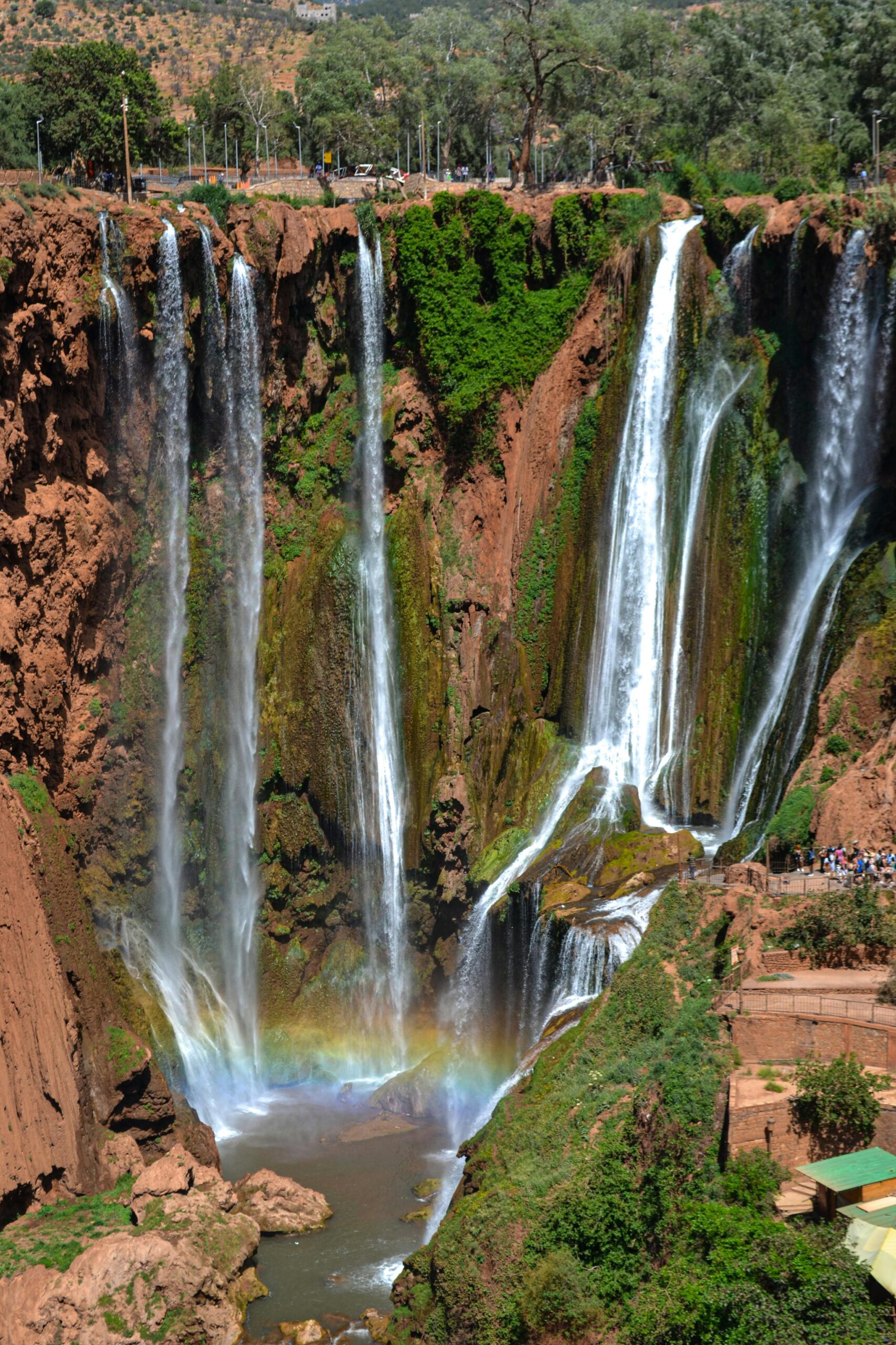Experience the stunning natural beauty of Ouzoud Waterfalls cascading over rugged rocks.