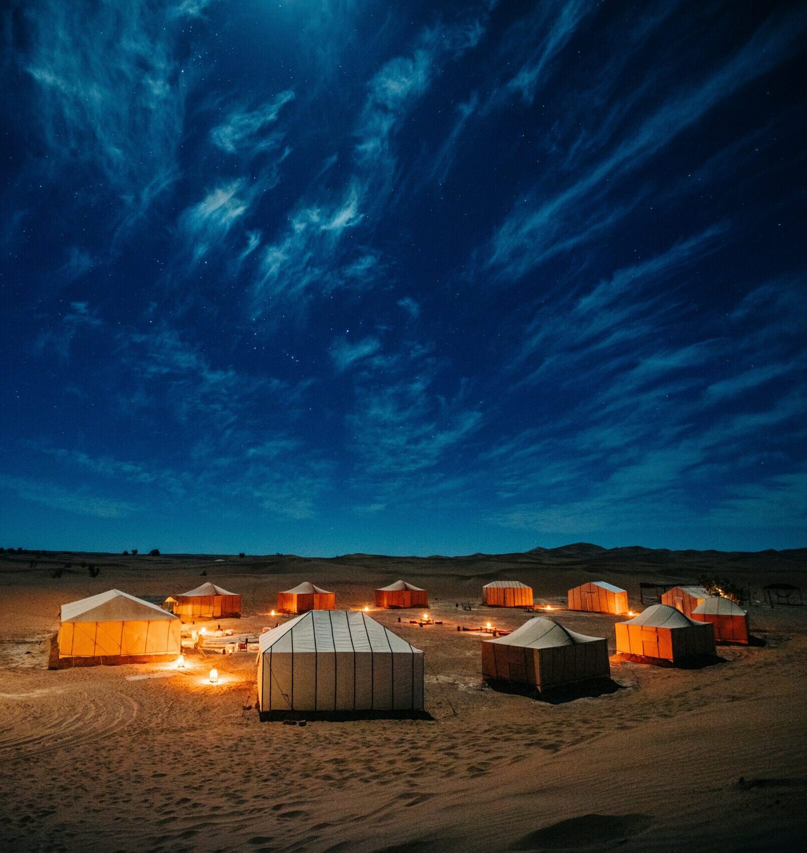 Sahara desert camp at night in Merzouga Morocco luxury tents